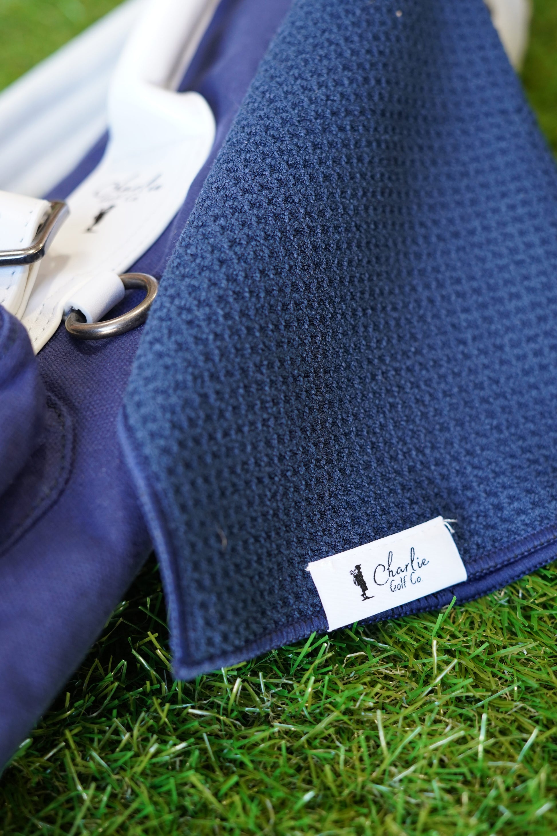 Blue kids golf bag with golf towel