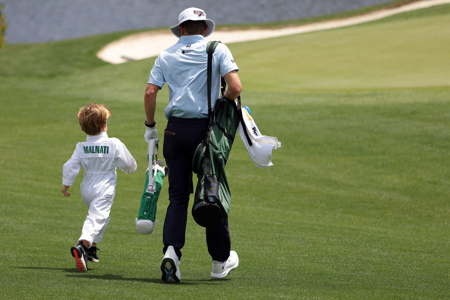 Green kid golf bag at The Masters