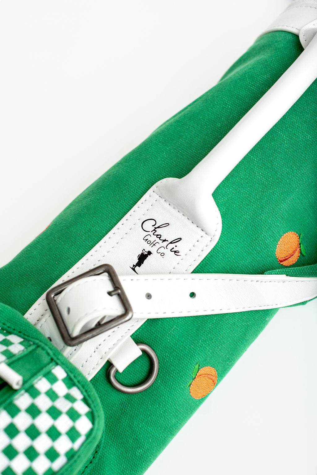 green youth golf bag with peaches