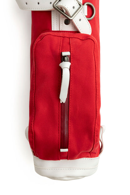red waxed canvas pocket on a toddler golf bag