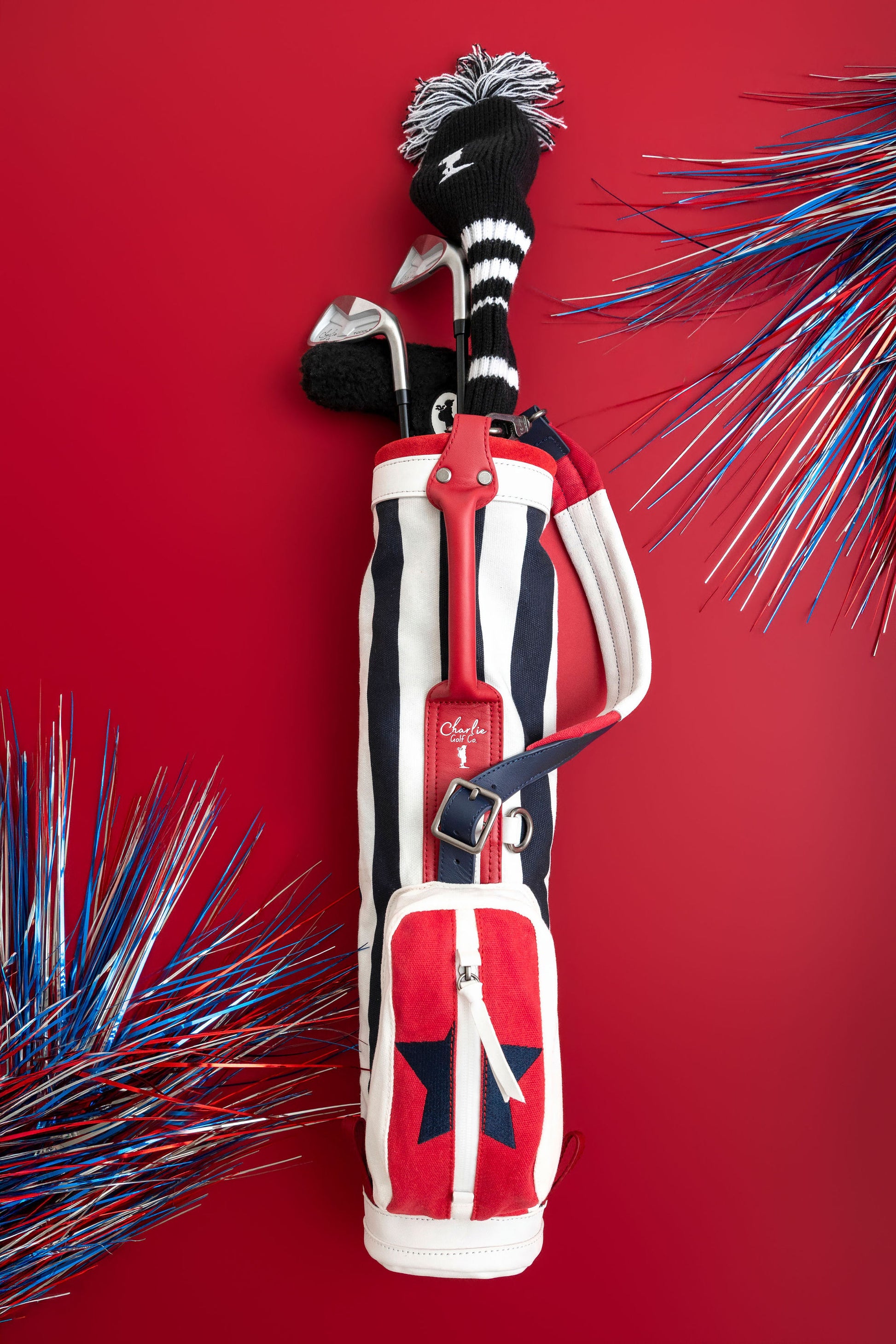 striped red white blue toddler golf bag with kids golf clubs