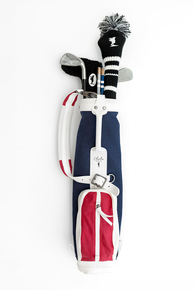kids golf clubs in red white and blue kids golf bag