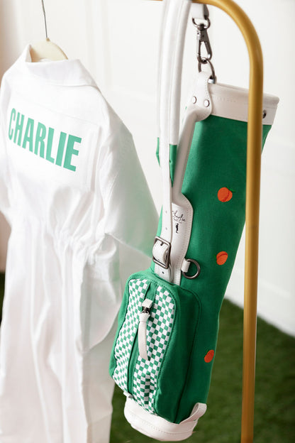 green toddler golf bag hanging