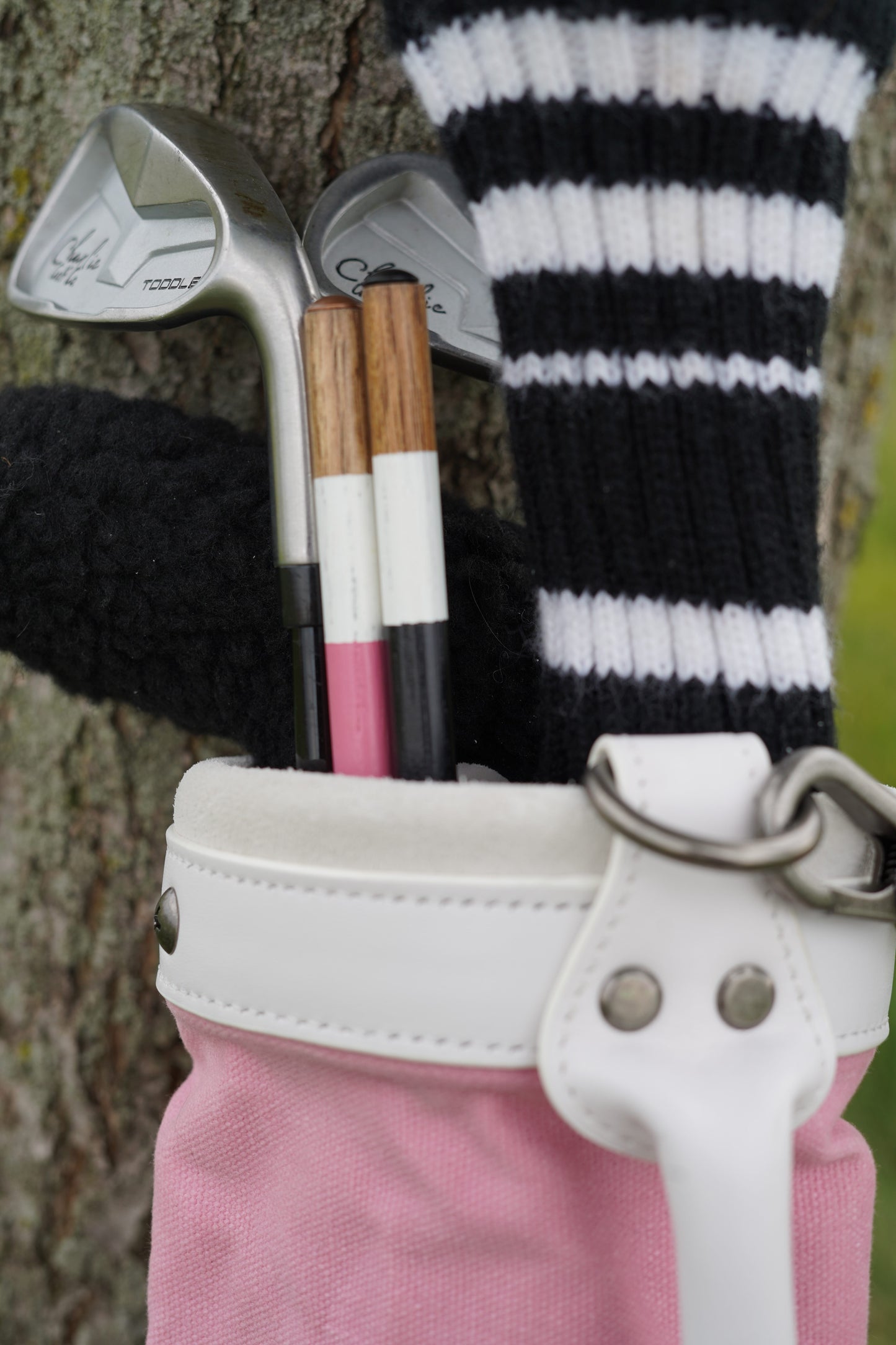pink kids golf bag with kids golf clubs